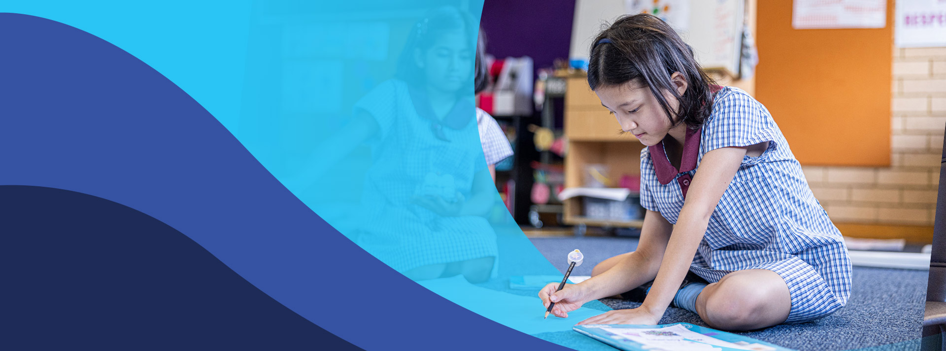 Student learning in the classroom at St John's Primary School Riverstone