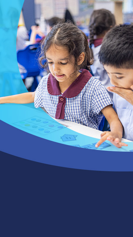 Students working together in the classroom at St John's Primary School Riverstone