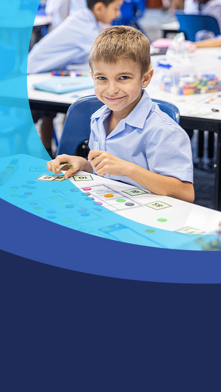 Student learning to count in the classroom at St John's Primary School Riverstone