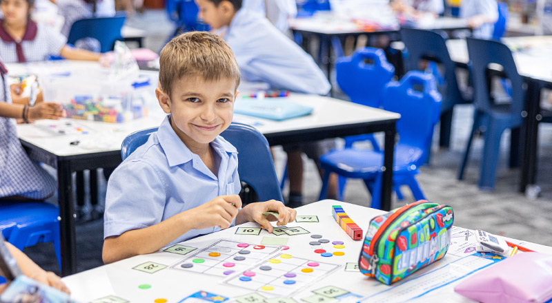 Student learning math in the classroom at St John's Primary School Riverstone