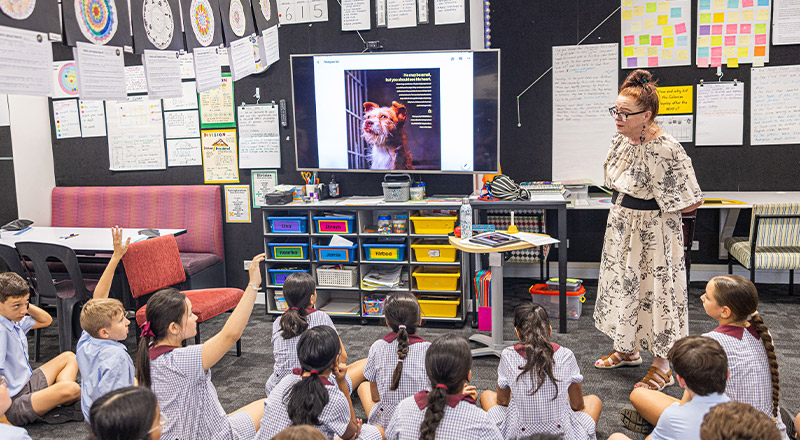 Teacher leading her class in a lesson at St John's Primary School Riverstone