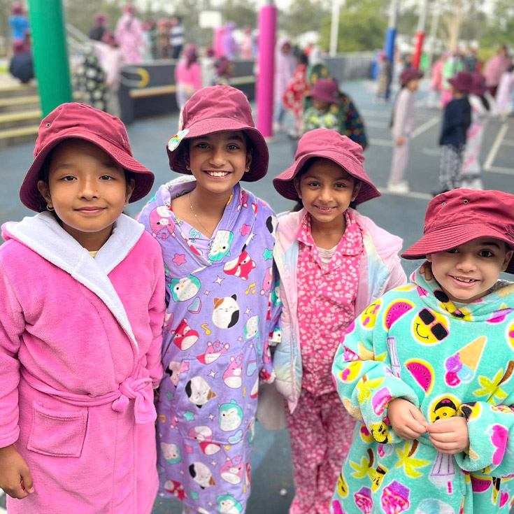 Students wearing their pajamas in the playground at St John's Primary School Riverstone
