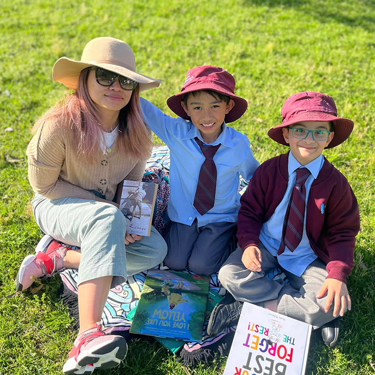 A mum with students at a school event at St John's Primary School Riverstone